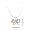 7 Promesse Bow Pendant in 18K White And Rose Gold